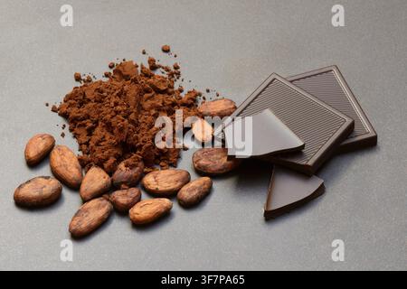 Cocoa powder, cocoa beans and dark chocolate Stock Photo
