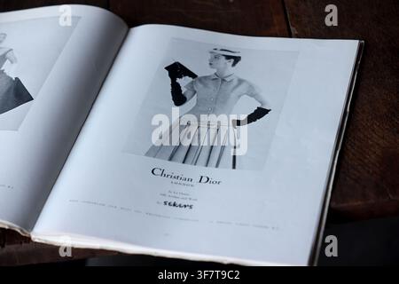 Christian Dior magazine advert pictured in a magazine from 1955, London, UK. Stock Photo