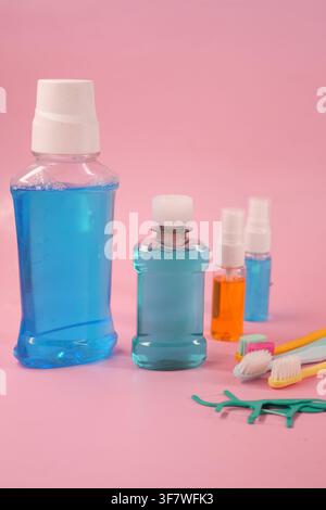Dental care products on pink background Stock Photo