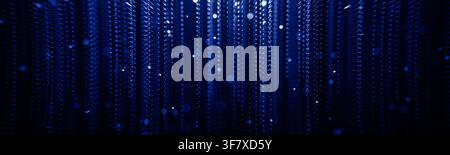Captivating abstract dark blue glowing vertical data matrix rain featuring bright falling particles, symbolizing futuristic digital technology, cybers Stock Photo
