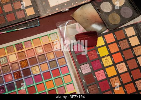 Beauty Brand Eye Shadow Palettes and Fabric Swatch for Costume Color Matching in Cocentaina on August 8, 2026, Spain Stock Photo