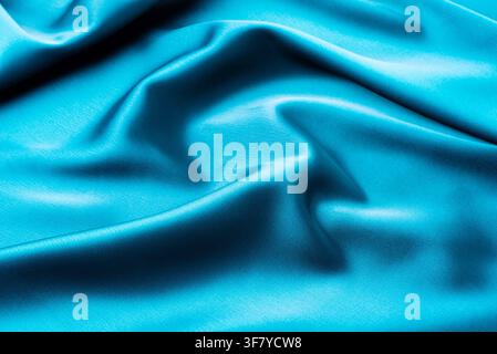 Turquoise satin texture Stock Photo