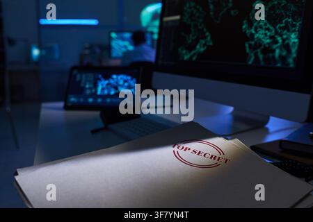 Top Secret Document Folder on Desk in Cyber Security Control Room Stock Photo