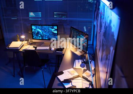 Empty Cybersecurity Control Room with Active Computer Screens at Night Stock Photo