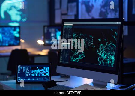 Computer Monitor Displaying Global Cyber Security Data in Control Room Stock Photo