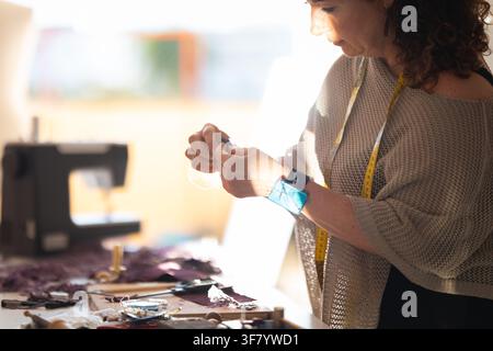 Woman craftswoman working on handmade fashion design Stock Photo