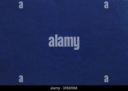 Close-up of blue synthetic leather with realistic grain texture. Premium abstract background for upholstery, fashion, automotive, branding, and design Stock Photo