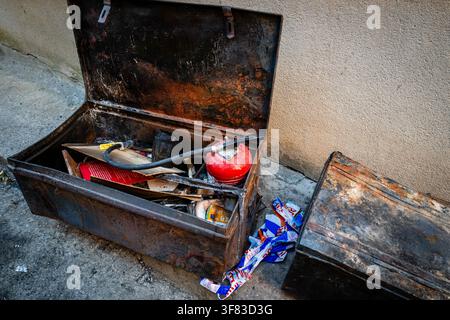 Montfort Sur Argens, France. 10th Aug, 2026. A box containing a fire extinguisher taken from a house that burned down during the Gros Bessillon fire in Montfort-sur-Argens, France, on August 10, 2026. Photo by Laurent Coust/ABACAPRESS.COM Credit: Abaca Press/Ģ����ý Live News Stock Photo