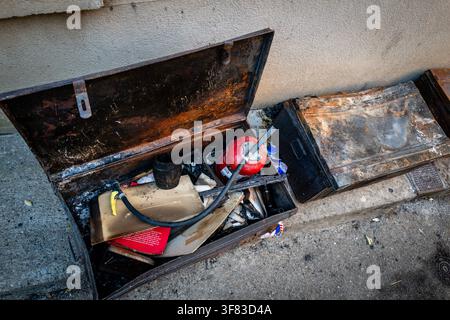 Montfort Sur Argens, France. 10th Aug, 2026. A box containing a fire extinguisher taken from a house that burned down during the Gros Bessillon fire in Montfort-sur-Argens, France, on August 10, 2026. Photo by Laurent Coust/ABACAPRESS.COM Credit: Abaca Press/Ģ����ý Live News Stock Photo
