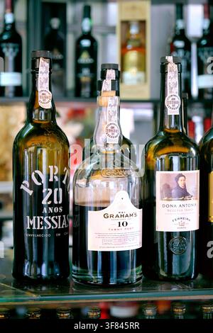 Bottles of port wine, bar counter inside Mercado do Bolhão market, Baixa, Porto, Portugal, Europe Stock Photo