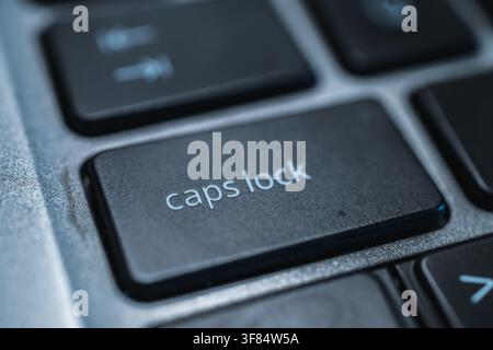 Macro view of caps lock key on computer keyboard Stock Photo