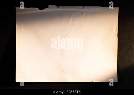 Blank vintage paper with torn edges and soft light for certificate letter or old document template Stock Photo