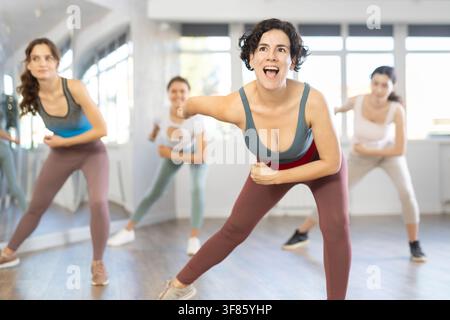 Funk jazz dancers practicing dance moves in studio Stock Photo