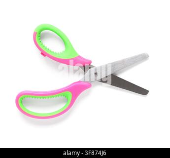 Pink and green childrens safety scissors with blunt metal blades for crafting and school supplies, isolated on a white background Stock Photo