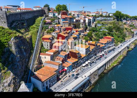 View of Funicular dos Guindais cable railway in Ribeira District from Dom Luís I Bridge in historic centre of Porto in Portugal, Southwestern Europe Stock Photo