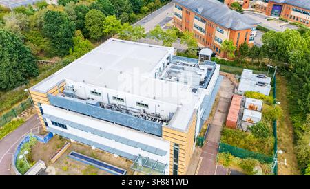 Aerial drone view of a decommissioned data centre with stripped cooling equipment on the roof Stock Photo