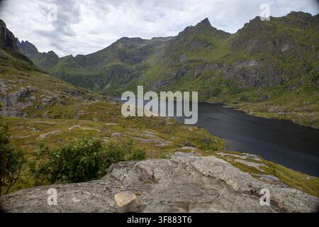 Beautiful summer landscape in A, Lofoten, Norway, featuring dramatic mountains, rugged terrain and a scenic coastal setting at the southern end of the Stock Photo