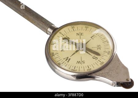 Vintage map measurer (curvimeter, opisometer) with integrated compass isolated on a white background. Classic cartographic measuring instrument used t Stock Photo