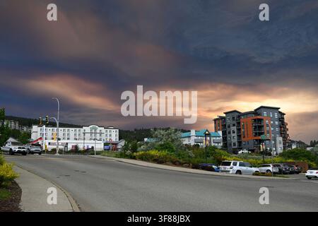 Kamloops, BC, Canada - July 7, 2026: Smoke from a wildfire in sky above city Kamloops, BC, Canada. Stock Photo