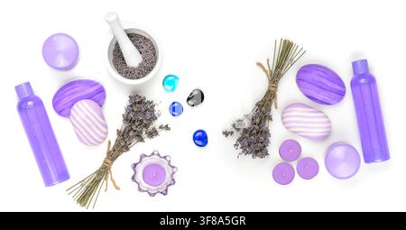 Big set. Soap, shampoo, towel, lavender oil, scented candles, dried lavender flowers isolated on white. Top view. Stock Photo