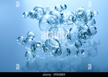 Glass molecular structure representing scientific research and biotechnology Stock Photo