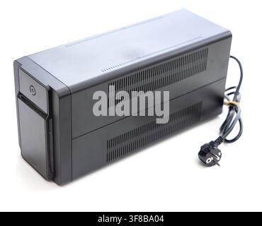 Black uninterruptible power supply device isolated on white background Stock Photo
