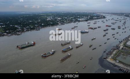 Aerial view of a busy shipyard with numerous cargo ships and boats ...
