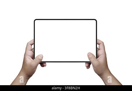 Hands holding a digital tablet with blank white screen mockup isolated on a white background Stock Photo