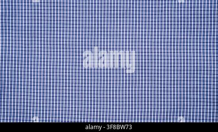 Blue Checkered Fabric Texture Background Close Up, suitable for shirt material, clothing background, textile design, apparel, and fashion pattern Stock Photo