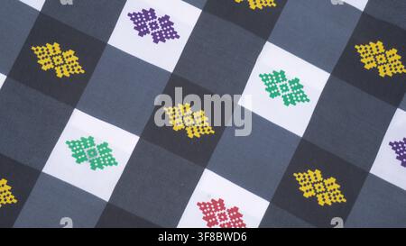Checkered Fabric Pattern With Colorful Decorative Motifs Stock Photo
