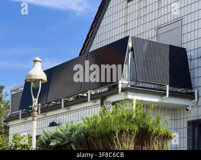 Several solar panels on a balcony in Wuppertal, Germany Stock Photo