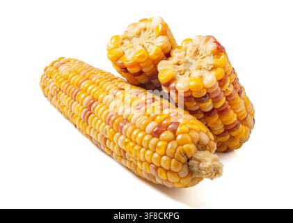 Boiled multicolored waxy corn cobs and cut segments isolated on white background Stock Photo