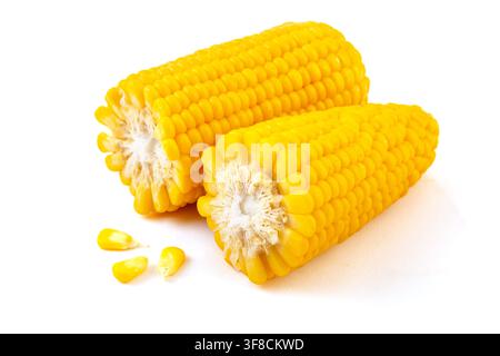 Boiled yellow waxy sweet corn cobs stack isolated on white background Stock Photo