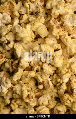 Extreme Macro Background Of Golden Seasoned Popcorn With Crispy Textures Stock Photo