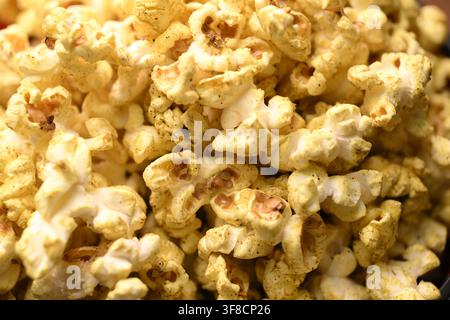 Golden Popcorn Macro Pattern Showcasing Savory Crunchy Snack Details Stock Photo