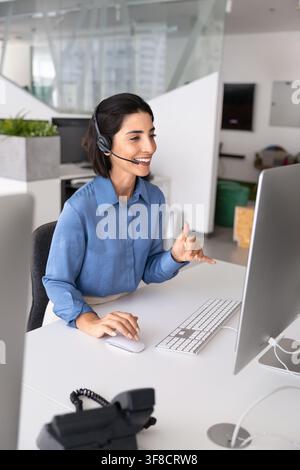 Operator wear headset engaging in remote customer service call Stock Photo
