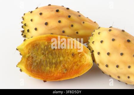Two Whole Prickly Pears and One halved Fruits on white Background Stock Photo