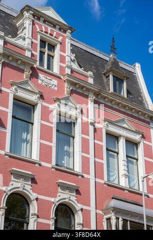 Nineteenth century townhouse facade in classic historical architecture in Rotterdam, Netherlands Stock Photo