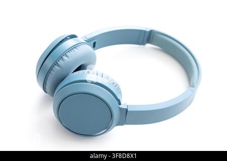 Light blue wireless headphones isolated on a white background Stock Photo