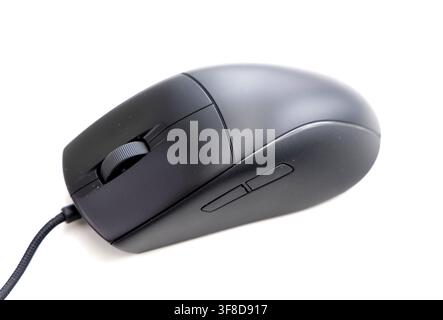 A modern black computer mouse rests on a white background Stock Photo