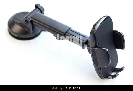 A black adjustable smartphone car mount with a suction cup base Stock Photo