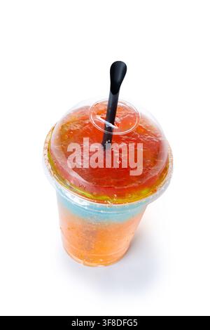 Orange Slush Drink in Plastic Cup isolated on white background Stock Photo
