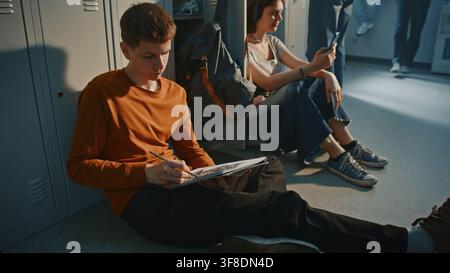 Young Male Student Practicing Wildlife Illustration Techniques at School Locker Hallway. Art Supply, Visual Storytelling About Gifted Teenagers, Youth Education, and Professional Sketching Skills. Stock Photo