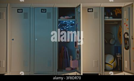 Rows of Neatly Arranged Lockers Represent Structure, Organization, Daily Routines in School Building. Minimal Educational Background with Generous Copy Space for Academic Youth Related Projects. Stock Photo