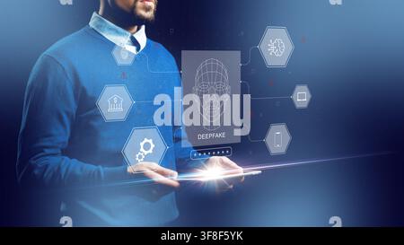 Man interacts with digital interface displaying deep fake concept in a modern setting Stock Photo