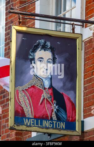 Portsmouth, UK - July 16th 2026: The sign on the exterior of The Wellington pub, located on the High Street in the historic Old Portsmouth area of the Stock Photo