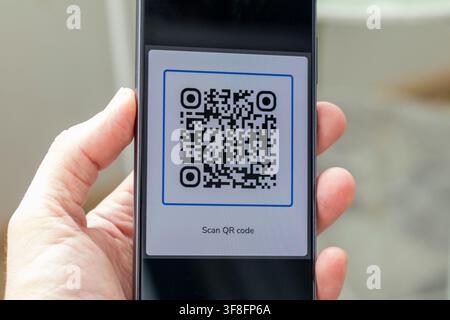 Smartphone Screen Displaying QR Code Interface with Scan Instructions Stock Photo
