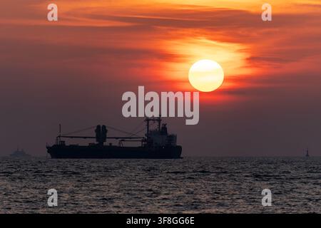 Silhouette of a ship during sunset in Kota Kinabalu Sabah Stock Photo