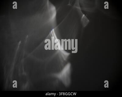 Subtle Caustics with Soft Edges. Abstract caustic light patterns created by refraction and reflection on a transparent surface. Stock Photo