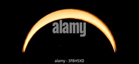 ASTEN - The sun during a partial solar eclipse. In the Netherlands, nearly 90 percent of the sun disappears behind the moon. ROB ENGELAAR / ANP netherlands out - belgium out Stock Photo